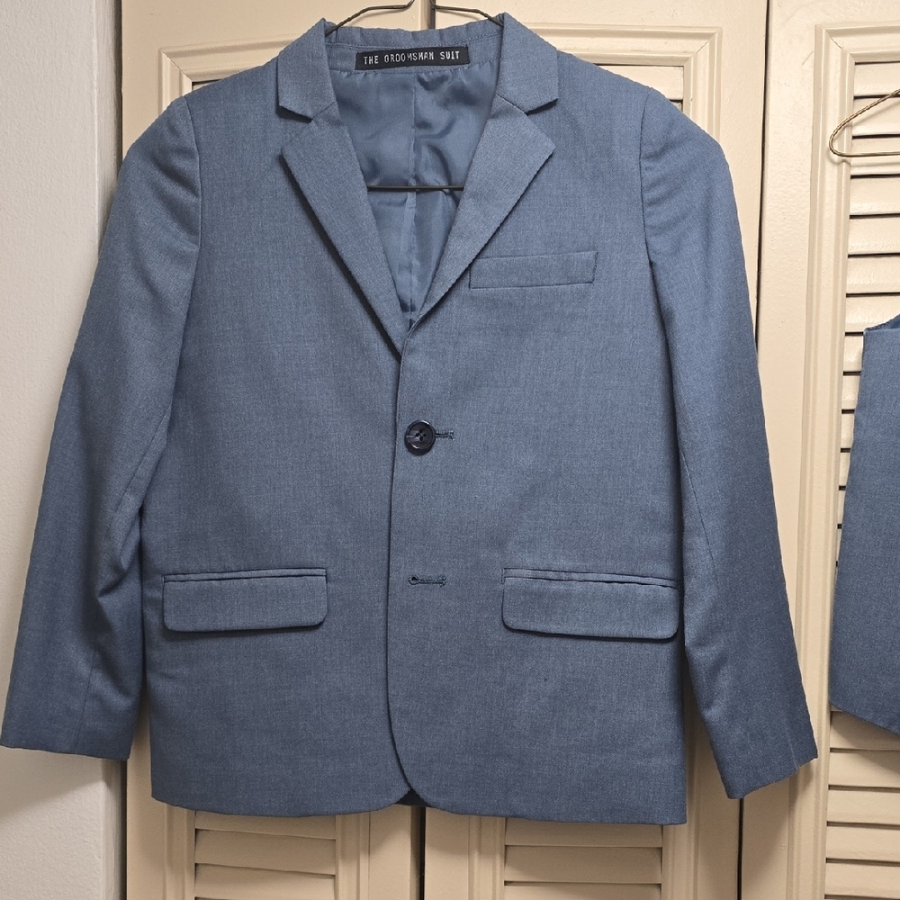 This is a complete suit for boys jacket and pant